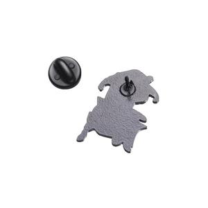 Detailed macro view of the black matte enamel pin back and rubber clutch fastener