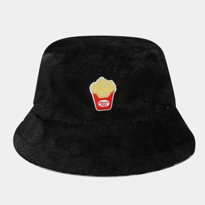 Detailed view of the soft black plush texture and French fries embroidery on the bucket hat