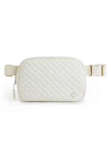 Detailed view of white quilted nylon waist bag with durable plastic buckle and zipper