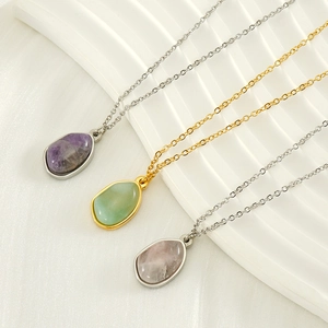 Irregular natural stone pendants in purple, green and pink on 18k gold plated chains