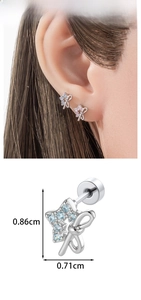 Detail of bow and star ear studs with blue and pink cubic zirconia and screw back