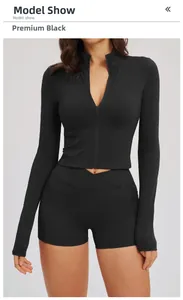Detailed front view of high-stretch fitness set with crossover high waist shorts in black