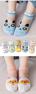 Detail of breathable summer mesh socks for kids featuring cute animal patterns