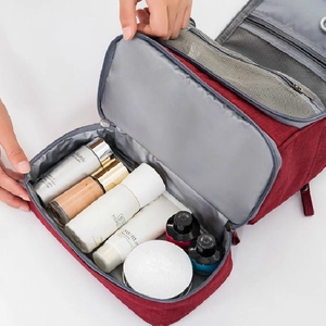 Large capacity red travel toiletry bag with waterproof fabric and dual mesh compartments