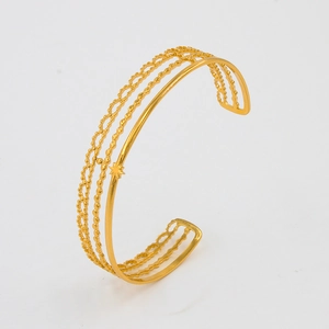 Minimalist gold-plated stainless steel layered open cuff bracelet with star pattern