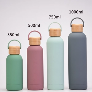 350ml to 1000ml double-layer vacuum insulated water bottles with bamboo lids and silicone handles