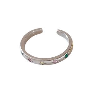 Silver adjustable ring set featuring colorful zircon star charms and geometric star patterns