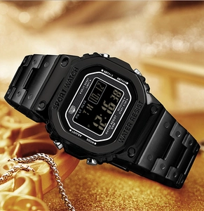Detail of square black digital sport watch featuring 50M water resistance and LED display