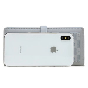 Grey long wallet next to a smartphone showing storage capacity and size comparison