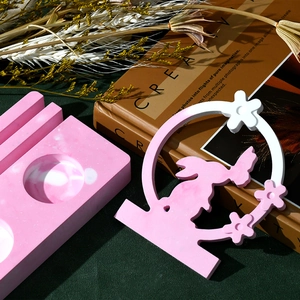 Detail of pink marble textured silicone mold with rabbit moon wreath for resin crafting