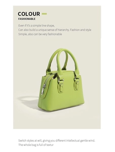 Détail du sac Boston vert clair avec fermeture éclair argentée et cuir PU lisse de qualité