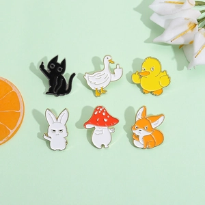 Close-up of a 6-piece set of funny middle finger animal and mushroom enamel pins