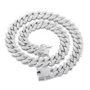 Silver Cuban link necklace with sparkling crystals and square buckle on white background