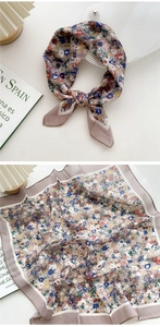 Detail view of cotton linen square scarf with vintage floral print and hemmed edges