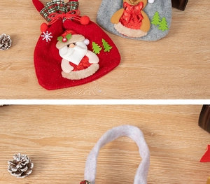 Detailed view of Christmas felt gift bags featuring Santa and reindeer felt appliques