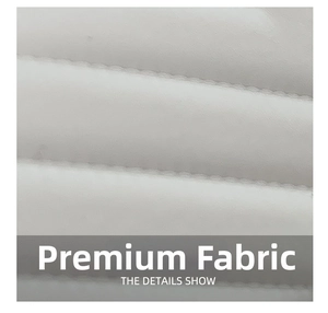Close-up of premium white quilted fabric with high-quality horizontal stitching details