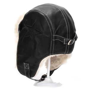 Detail of kids faux leather trapper hat with star emboss and cozy fleece lining