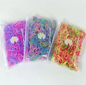 Detailed view of colorful elastic hair bands in transparent zipper bags for girls