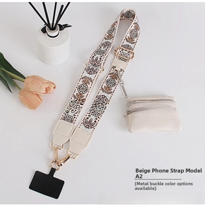 Detail of bohemian floral fabric strap with gold metal hooks and mini coin purse pouch