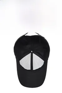 Detail view of the breathable mesh crown and sweatband inside the black baseball cap