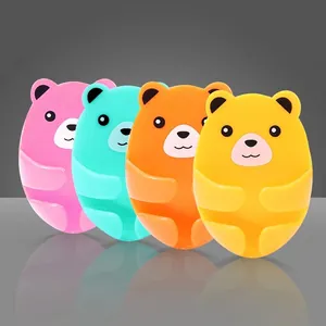 Adhesive bear plug hooks set in four vibrant colors for wall cable management