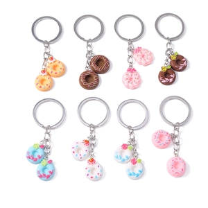 Set of 8 creative cartoon donut keychains in various colorful resin food styles