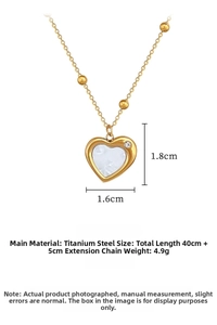 Detailed view of heart shell pendant with dimensions 1.6x1.8cm on titanium steel chain
