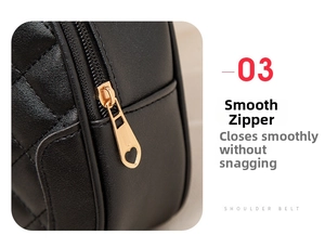 Close-up of black quilted leather bag featuring a gold heart-shaped metal zipper detail