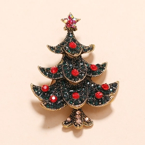 Vintage Christmas tree brooch with colorful rhinestones on a gold-plated metal base