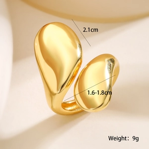 Macro shot showing dimensions of a 18K gold irregular geometric liquid-style ring