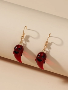 Close-up of translucent burgundy resin ghost earrings with gold hooks for Halloween