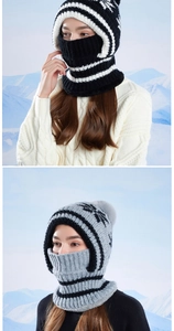 Detail of winter knitted thermal hat set with snowflake pattern and fluffy pom pom decor