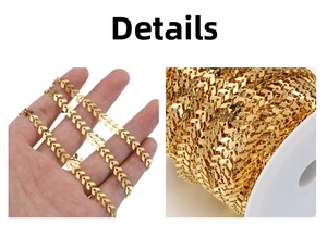 Detail of gold arrow chain link DIY jewelry accessories on spool and hand display