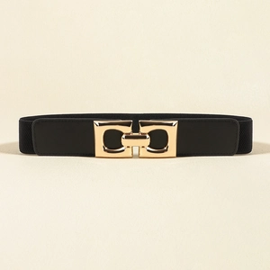 Detail of a black elastic waist belt featuring a polished gold-tone metal buckle