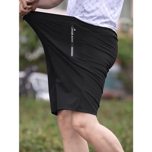 Detail showing high-elastic black sports shorts with New Sport text on zipper