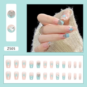 French style press-on nails with blue-pink gradient heart and rhinestone accents