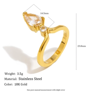 Detail view of gold ring with teardrop zircon and dimensions showing 23.8mm height