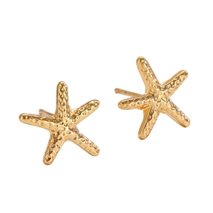 Exquisite gold starfish stud earrings with realistic textured finish on white background
