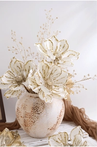 Champagne gold artificial magnolia flowers in vintage ceramic vase for Christmas decor
