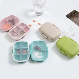 Portable eco-friendly multi-compartment pill box in four colors with a folding design