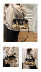 Detail of crossbody bag featuring crocodile texture, leopard print, and gold lion emblem