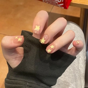 Kurze gelbe Stern-Nägel zum Aufkleben mit Katzenaugen-Effekt für sommerliche Looks