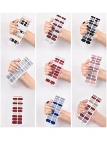 Detail view of 9 nail sticker designs from SS-028 to SS-036 in various colors and patterns