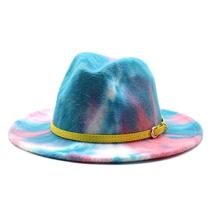 Detailed macro view of vibrant blue and pink tie-dye wool felt hat with yellow belt buckle