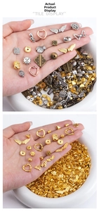 Detailed mixed alloy charms including hearts and wings in gold, silver, and bronze