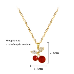 Detail view of red crystal cherry necklace with chain length and weight specifications