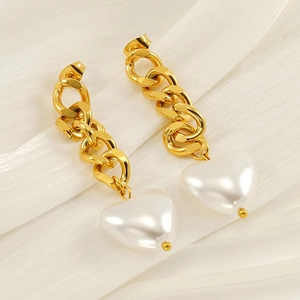 Chunky 18K gold plated chain earrings with white heart pearl drops on white silk background