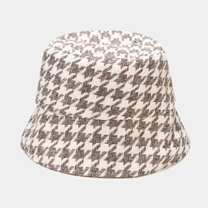 Close-up of the houndstooth pattern texture on the thickened wool fisherman bucket hat