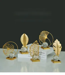 Modern Nordic crystal ball set with golden iron leaves on square metal bases