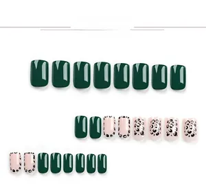 Short square press on nails set with dark green and leopard print patterns on pink base